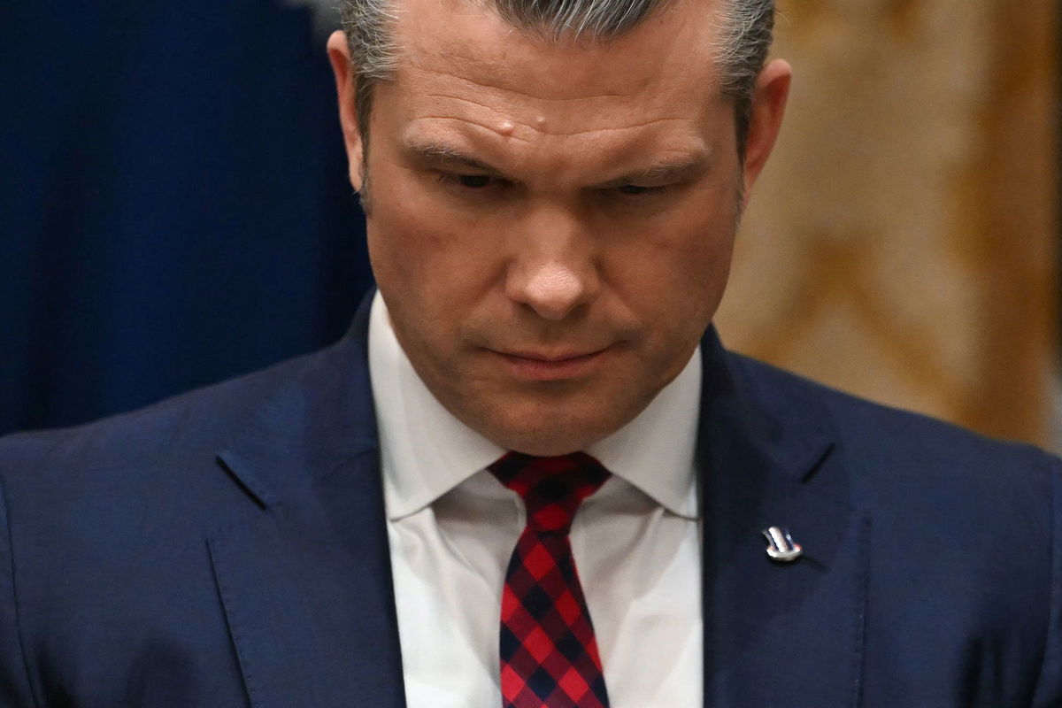 Secretary of Defense Pete Hegseth listens as President Donald Trump speaks during a Cabinet meeting at the White House