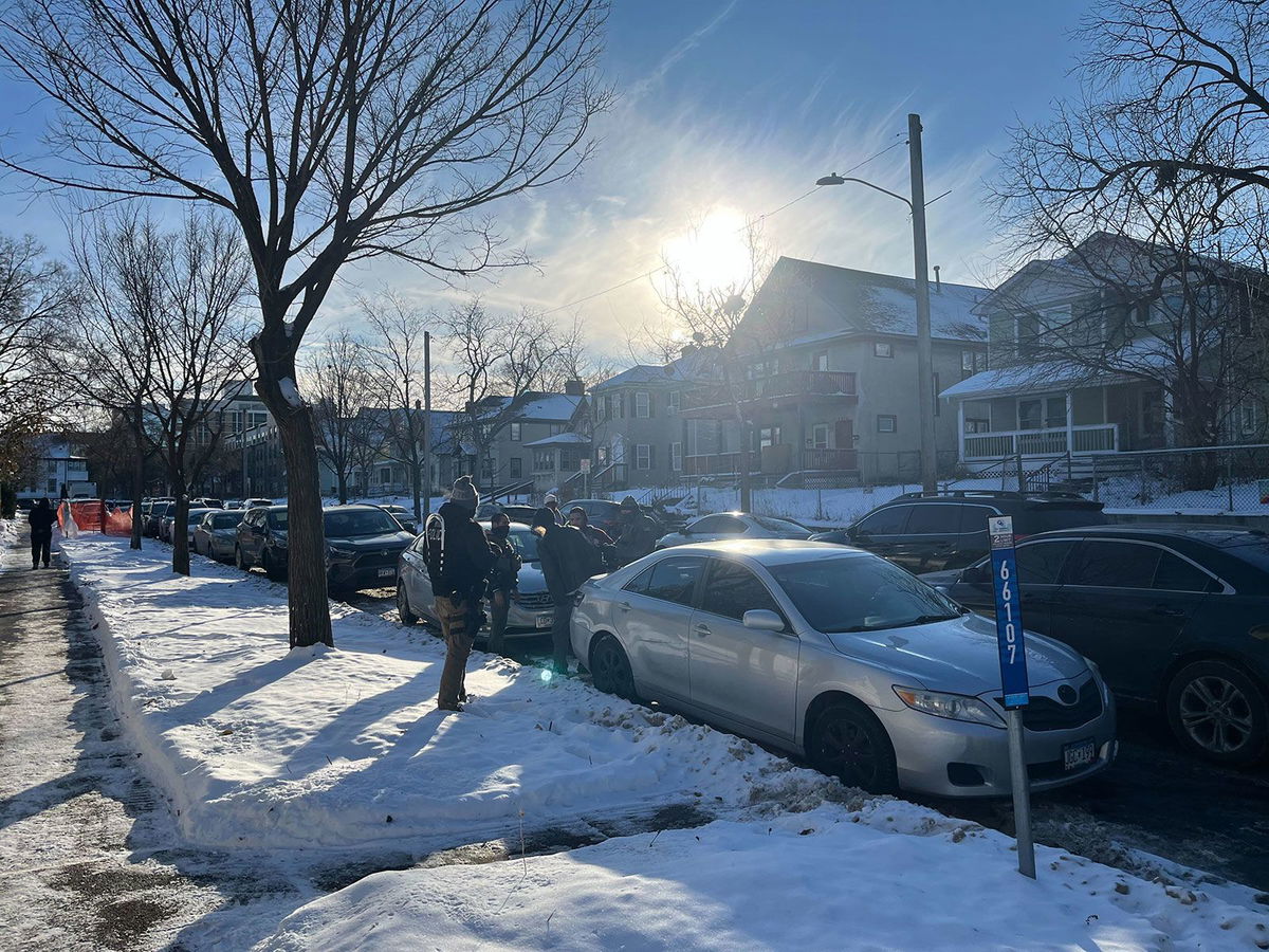 A man walks through the Cedar-Riverside neighborhood